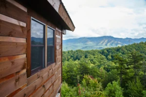 looking out at beautiful mountain view from rustic Gatlinburg cabin