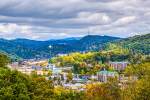 view of downtown Gatlinburg surrounded by the beautiful Smoky Mountains